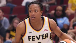 Kelsey Mitchell #0 of the Indiana Fever dribbles against the Chicago Sky during the second half at the United Center on July 27, 2025.