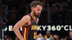 Trae Young #11 of the Atlanta Hawks reacts after a rebound by the Miami Heat.