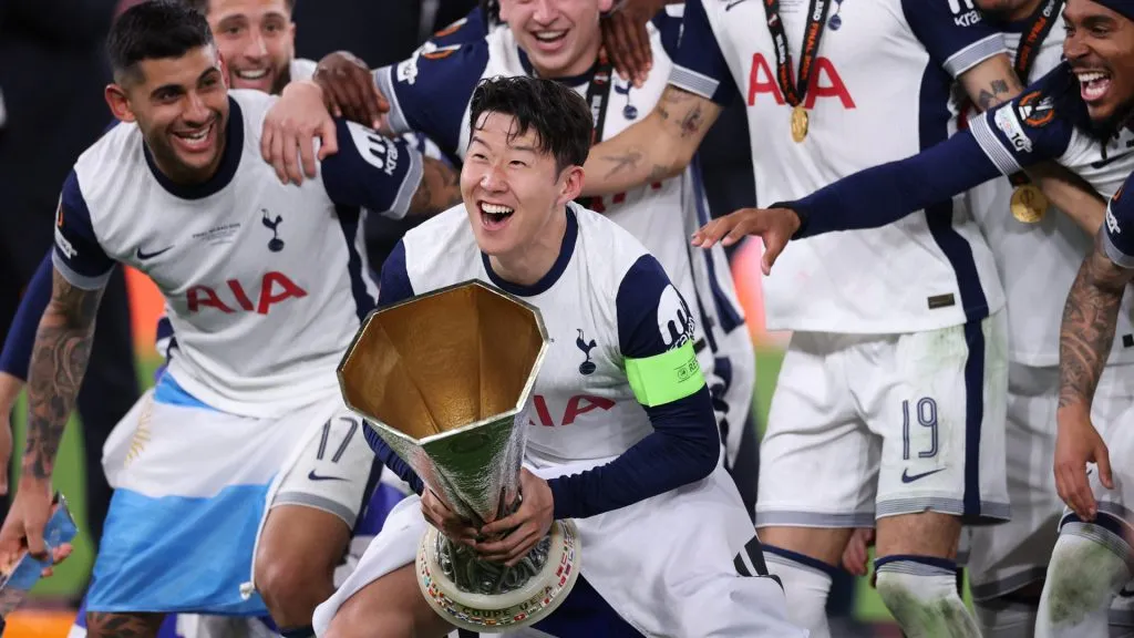 Son Heung-Min lifts the UEFA Europa League trophy after his team’s victory in the UEFA Europa League Final 2025 against Man United. (Michael Steele/Getty Images)