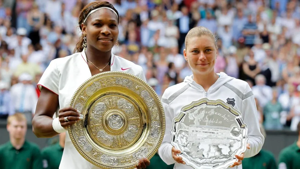 Ladies Champion Serena Williams of USA (L) and runner up Vera Zvonareva of Russia pose after their Wimbledon final. (Matthew Stockman/Getty Images)
