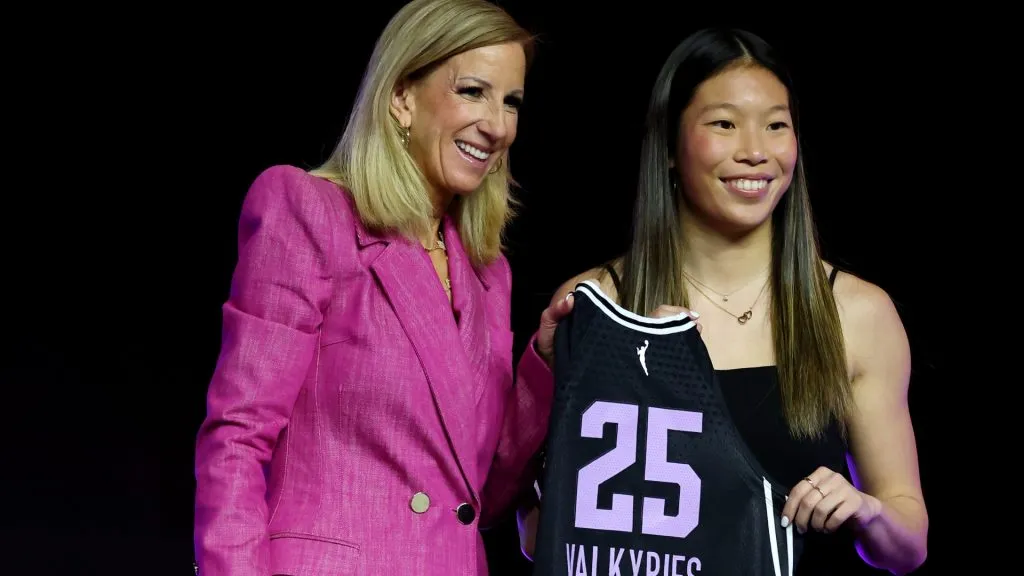 Kaitlyn Chen poses for a photo with WNBA Commissioner Cathy Engelbert after being selected with the 30th pick in the third round by the Golden State Valkyries during the 2025 WNBA Draft. (Source: Elsa/Getty Images)