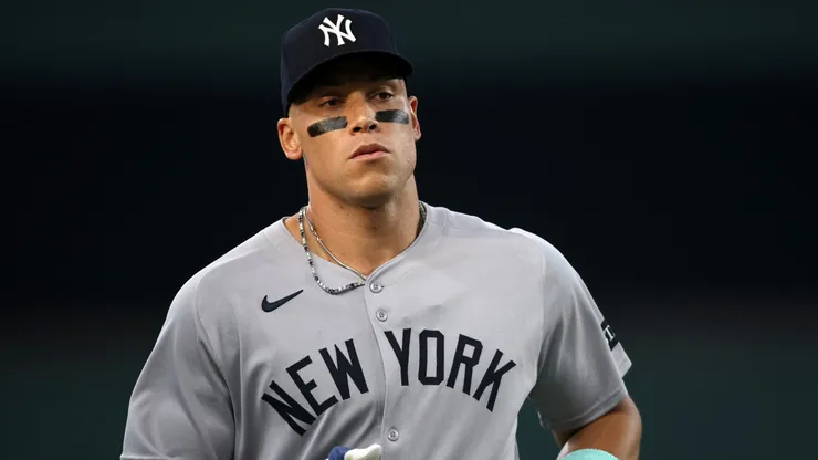 Aaron Judge #99 of the New York Yankees runs on the field.