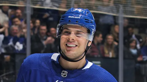 Auston Matthews #34 of the Toronto Maple Leafs seems very pleased after setting up teammate William Nylander #29 for a goal against the Buffalo Sabres during an NHL game at the Air Canada Centre on April 2, 2018 in Toronto, Ontario, Canada.