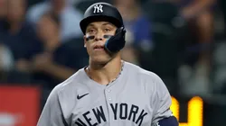 Aaron Judge #99 of the New York Yankees walks back to the dugout after striking out.
