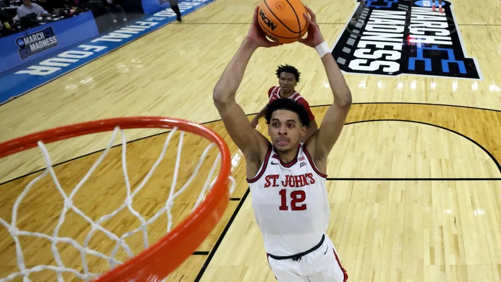 RJ Luis Jr. #12 of the St. John’s Red Storm dunks the ball against the Arkansas Razorbacks in the second round of the 2025 NCAA Men’s Basketball Tournament. (Source: Emilee Chinn/Getty Images)