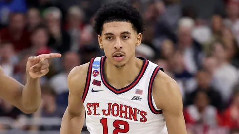 Luis Jr. #12 of the St. John's Red Storm dribbles against the Arkansas Razorbacks during the second half in the second round of the NCAA Men's Basketball Tournament in 2025.