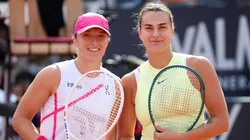 Iga Swiatek of Poland and Aryna Sabalenka pose at the net before their Women's Singles Final Match during Day 13 of the Internazionali BNL D'Italia 2024.