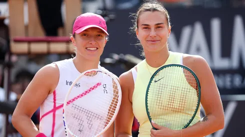 Iga Swiatek of Poland and Aryna Sabalenka pose at the net before their Women's Singles Final Match during Day 13 of the Internazionali BNL D'Italia 2024.