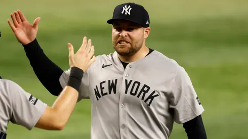 David Bednar #53 of the New York Yankees and teammate Ben Rice #22 celebrate.