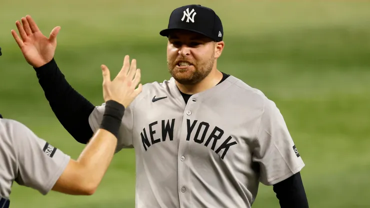 David Bednar #53 of the New York Yankees and teammate Ben Rice #22 celebrate.
