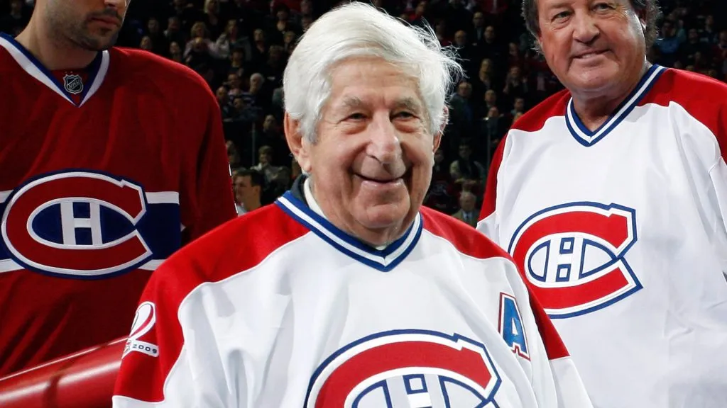 Elmer Lach is honored by having his number retired during the Centennial Celebration ceremonies prior to the NHL game between the Montreal Canadiens and Boston Bruins in 2009. (Source: Richard Wolowicz/Getty Images)