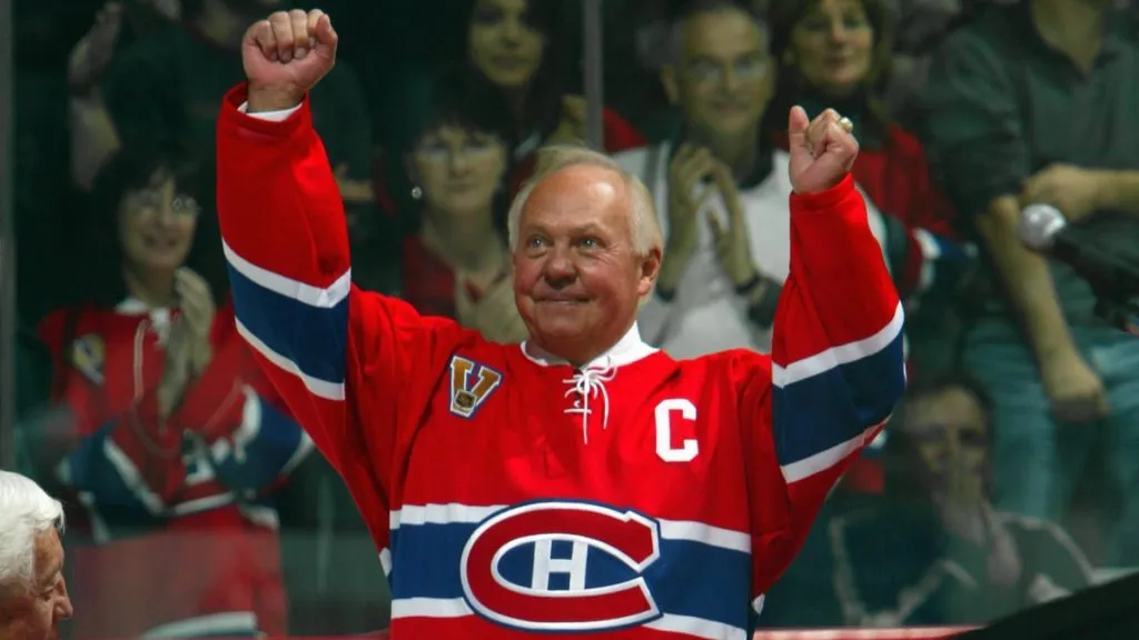 Yvan Cournoyer acknowledges the crowd during a ceremony to retire the #12 in honor of Cournoyer and fellow Hall of Famer Dickie Moore before the NHL game in 2005. (Source: Charles Laberge/Getty Images)