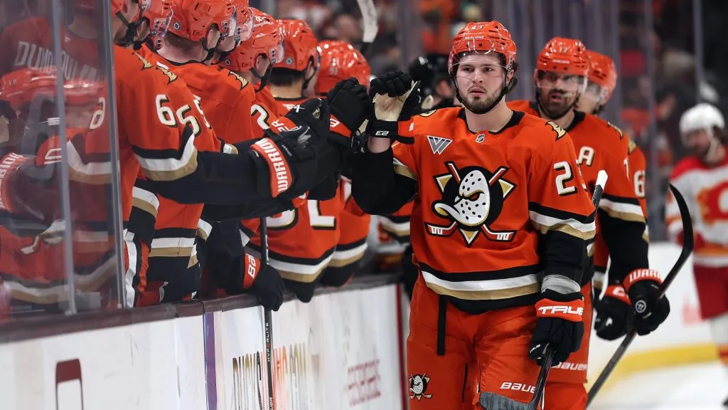 Mason McTavish #23 of the Anaheim Ducks is congratulated at the bench after scoring a goal during the third period of a game against the Calgary Flames at Honda Center on January 07, 2025 in Anaheim, California. (Photo by Sean M. Haffey/Getty Images)