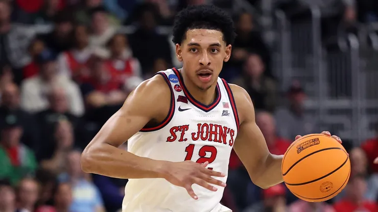 RJ Luis Jr. #12 of St. John's Red Storm dribbles the ball during the first half in the first round of the NCAA Men's Basketball Tournament against the Omaha Mavericks at Amica Mutual Pavillion on March 20, 2025.
