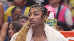 Angel Reese #5 of the Chicago Sky looks on from the bench against the Indiana Fever during the first half