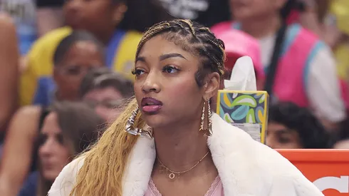 Angel Reese #5 of the Chicago Sky looks on from the bench against the Indiana Fever during the first half