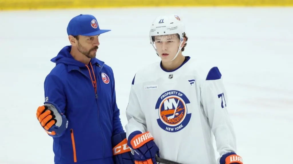 Bridgeport coach Rocky Thompson and Matthew Schaeffer #71 take part in practice during the New York Islanders 2025 Development Camp at Northwell Health Ice Center at Eisenhower Park on June 30, 2025 in East Meadow, New York. (Photo by Bruce Bennett/Getty Images)