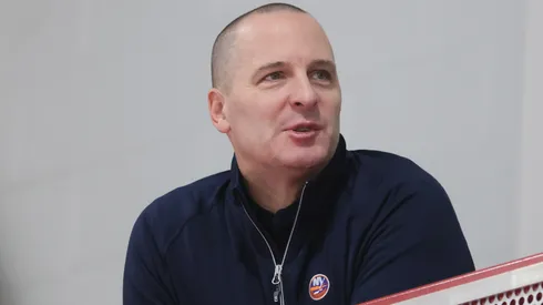General Manager Mathieu Darche watches practice during the New York Islanders 2025 Development Camp at Northwell Health Ice Center at Eisenhower Park on June 30, 2025 in East Meadow, New York.