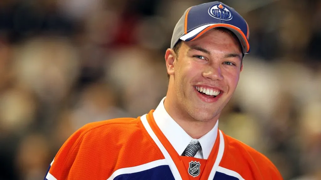 Taylor Hall, drafted #1 overall by the Edmonton Oilers, smiles to the crowd after being drafted during the 2010 NHL Entry Draft at Staples Center on June 25, 2010. (Source: Jeff Gross/Getty Images)