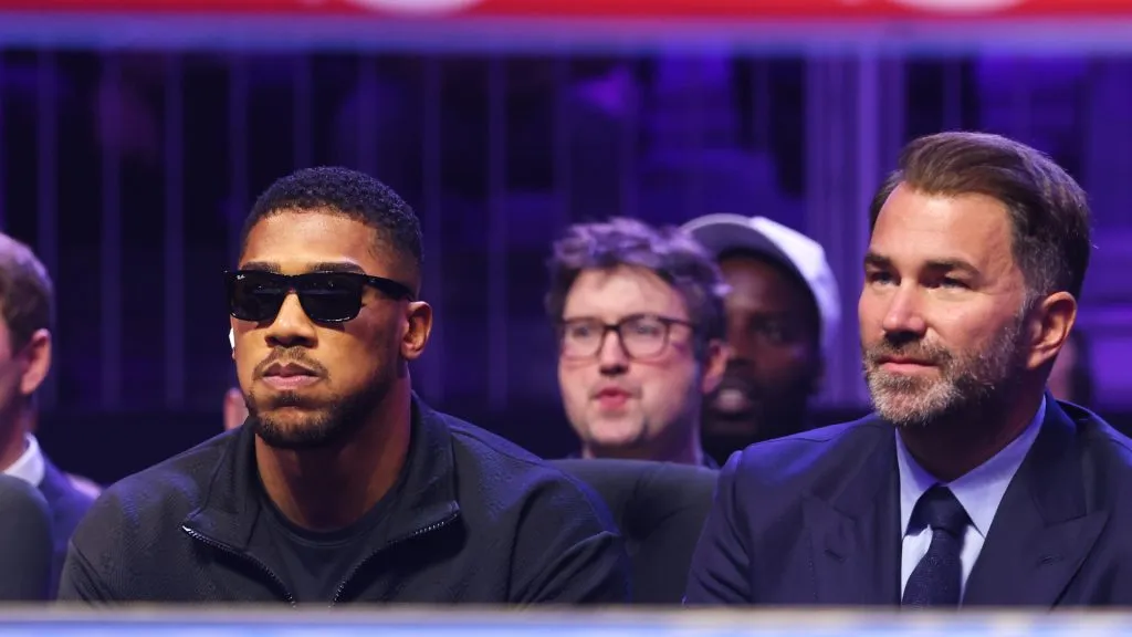 Anthony Joshua and Eddie Hearn, Chairman of Matchroom Sport, look on from ringside during the WBO Interim World Light Heavyweight Title fight between Joshua Buatsi and Callum Smith as part of Beterbiev v Bivol 2: The Last Crescendo at Kingdom Arena on February 22, 2025 in Riyadh, Saudi Arabia. (Photo by Richard Pelham/Getty Images)