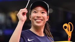Kaitlyn Chen celebrates with a piece of the net after beating the South Carolina Gamecocks 82-59 to win the National Championship of the NCAA Women's Basketball Tournament in 2025.