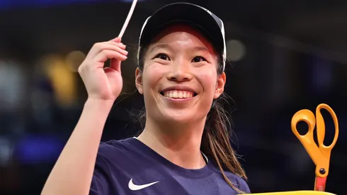 Kaitlyn Chen celebrates with a piece of the net after beating the South Carolina Gamecocks 82-59 to win the National Championship of the NCAA Women's Basketball Tournament in 2025.