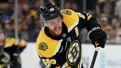 David Pastrnak skates during a Boston Bruins game as contract controversy surrounds the team.