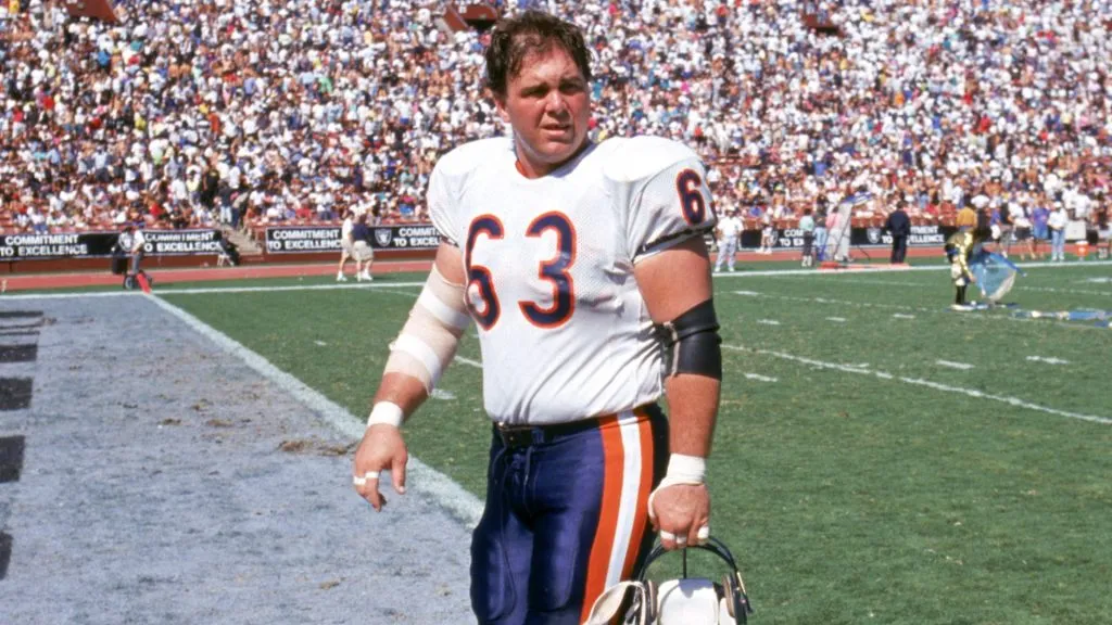 Center Jay Hilgenberg #63 of the Chicago Bears walks off the field during a game against the Los Angeles Raiders at the Los Angeles Memorial Coliseum on September 30, 1990. (Source: George Rose/Getty Images)
