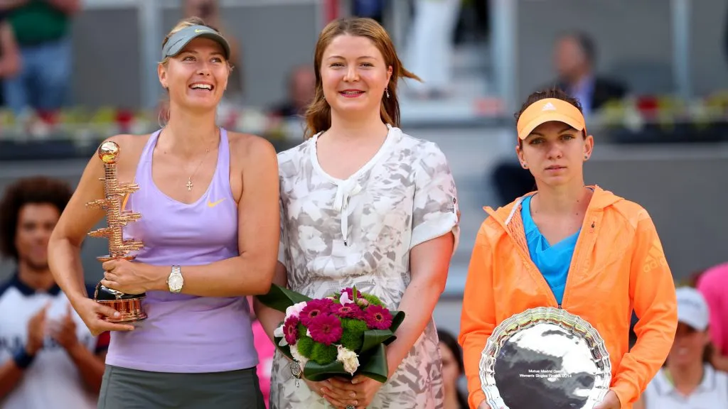 Maria Sharapova of Russia, Dinara Safina of Russia and Simona Halep of Romania hold there winner and runner up trophies after their Madrid Open final. (Clive Brunskill/Getty Images)