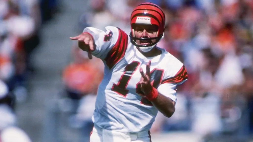 Cincinnati Bengals quarterback Ken Anderson throws a pass during game against the Denver Bronos at Mile High Stadium in 1984. (Source: Allsport – Getty Images)
