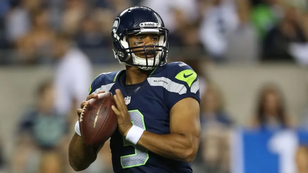 Quarterback Russell Wilson #3 of the Seattle Seahawks looks to pass against the Tennessee Titans at CenturyLink Field on August 11, 2012. (Source: Otto Greule Jr/Getty Images)