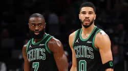 Jayson Tatum #0 of the Boston Celtics and Jaylen Brown #7 look on in Game Five of the Eastern Conference First Round NBA Playoffs against the Orlando Magic.