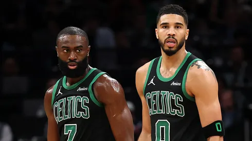Jayson Tatum #0 of the Boston Celtics and Jaylen Brown #7 look on in Game Five of the Eastern Conference First Round NBA Playoffs against the Orlando Magic.