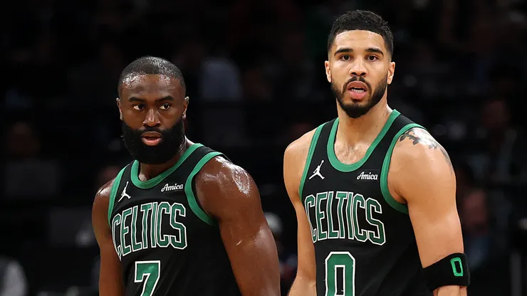 Jayson Tatum #0 of the Boston Celtics and Jaylen Brown #7 look on in Game Five of the Eastern Conference First Round NBA Playoffs against the Orlando Magic.