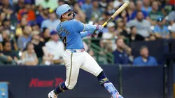 William Contreras #24 of the Milwaukee Brewers hits a two run home run in the seventh inning against the New York Mets.