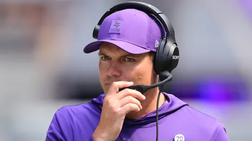 Minnesota Vikings Head Coach Kevin O'Connell talks in his headset during the NFL Preseason 2025 game between Houston Texans and Minnesota Vikings at U.S. Bank Stadium on August 9, 2025.