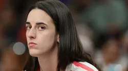 Caitlin Clark #22 of the Indiana Fever watches from the bench during the first half of the WNBA game against the Phoenix Mercury at PHX Arena on August 07, 2025 in Phoenix, Arizona.