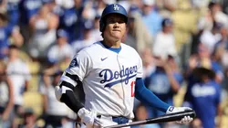 Shohei Ohtani #17 of the Los Angeles Dodgers reacts after striking out with the bases loaded.