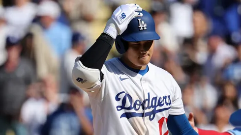 Shohei Ohtani #17 of the Los Angeles Dodgers reacts after striking out with the bases loaded.