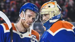 Connor McDavid #97 and Stuart Skinner #74 of the Edmonton Oilers celebrate after defeating the Calgary Flames in the 2023 Tim Hortons NHL Heritage Classic at Commonwealth Stadium on October 29, 2023 in Edmonton, Alberta, Canada.