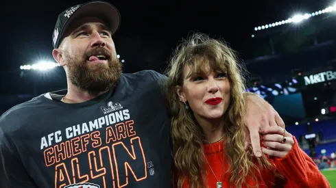 Travis Kelce #87 of the Kansas City Chiefs (L) celebrates with Taylor Swift after defeating the Baltimore Ravens in the AFC Championship Game at M&T Bank Stadium on January 28, 2024 in Baltimore, Maryland.
