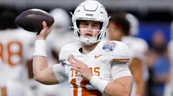 Arch Manning #16 of the Texas Longhorns warms up prior to the Chick-fil-A Peach Bowl against the Arizona State Sun Devils at Mercedes-Benz Stadium on January 01, 2025 in Atlanta, Georgia.