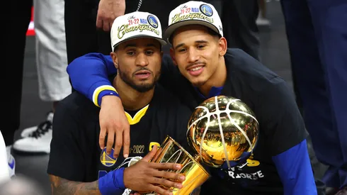 Gary Payton II #0 and Juan Toscano-Anderson #95 of the Golden State Warriors celebrate after defeating the Boston Celtics 103-90 in Game Six of the 2022 NBA Finals.