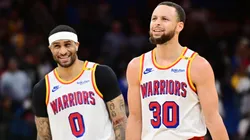 Stephen Curry #30 and Gary Payton II #0 of the Golden State Warriors.