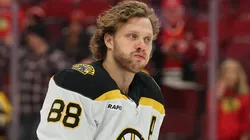 David Pastrnak #88 of the Boston Bruins warms up prior to the game against the Chicago Blackhawks at the United Center on December 04, 2024 in Chicago, Illinois.