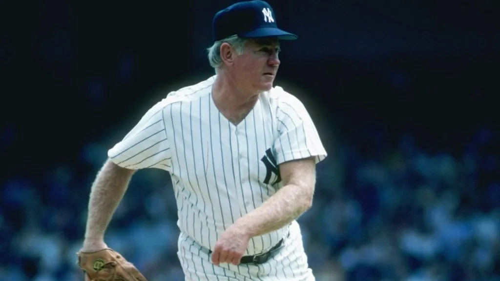 Pitcher Whitey Ford of the New York Yankees throws a pitch during a game at Yankee Stadium in 1982. (Source: T. G. Higgins /Allsport)