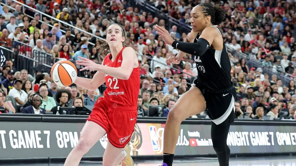 Caitlin Clark #22 of the Indiana Fever drives against A’ja Wilson #22 of the Las Vegas Aces in the third quarter of their game at T-Mobile Arena. (Ethan Miller/Getty Images)