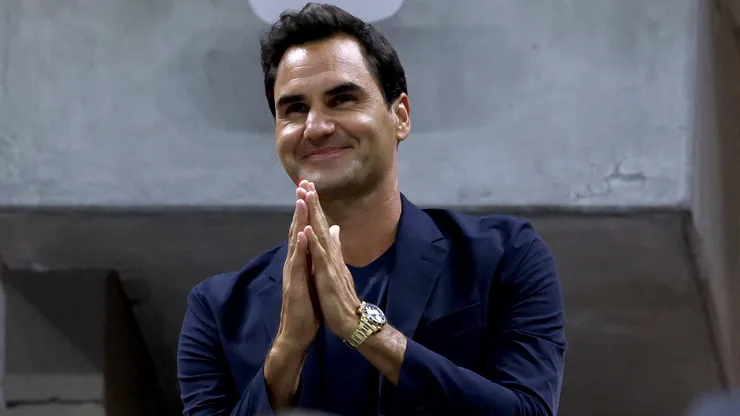 Roger Federer is recognized during the Women's Singles Quarterfinal match between Zheng Qinwen of China and Aryna Sabalenka of Belarus at the 2024 US Open.