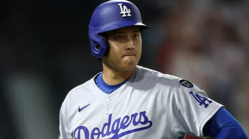 Shohei Ohtani #17 of the Los Angeles Dodgers reacts after hitting into a triple play against the Los Angeles Angels.
