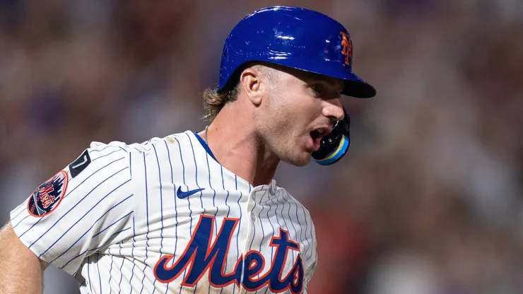 Pete Alonso #20 of the New York Mets reacts after hitting a solo home run.